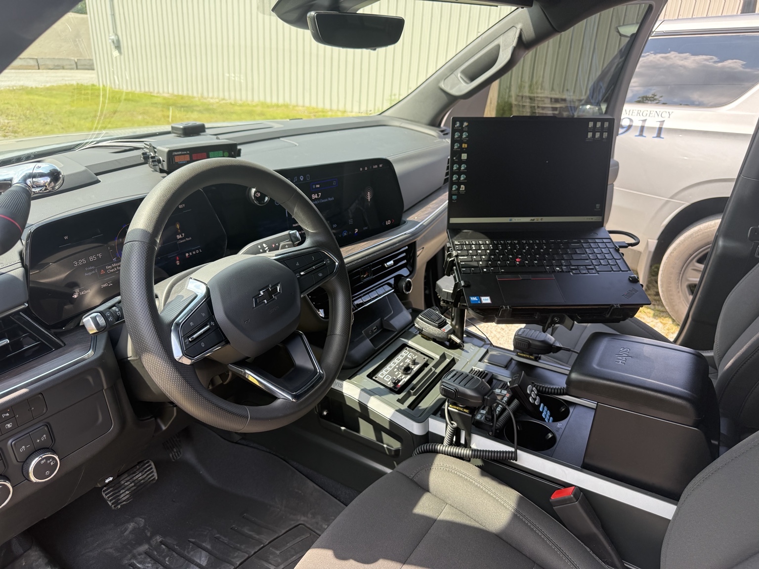 Completed Chevrolet public safety vehicle interior with Havis console laptop mount radios and control system